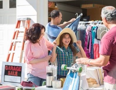 Mother and daughter at a garage sale