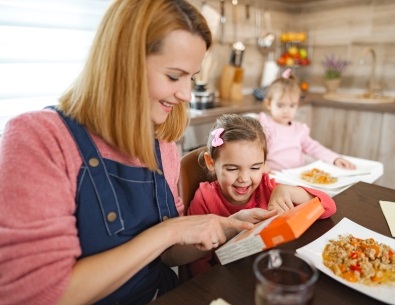 Mother and daughter cooking in the kitchen