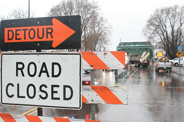 detour and road closed sign on the road